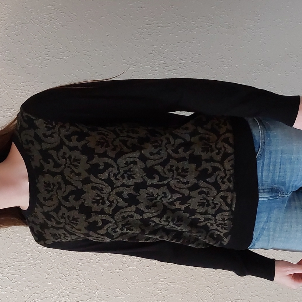 Black sweater with gold knitted design